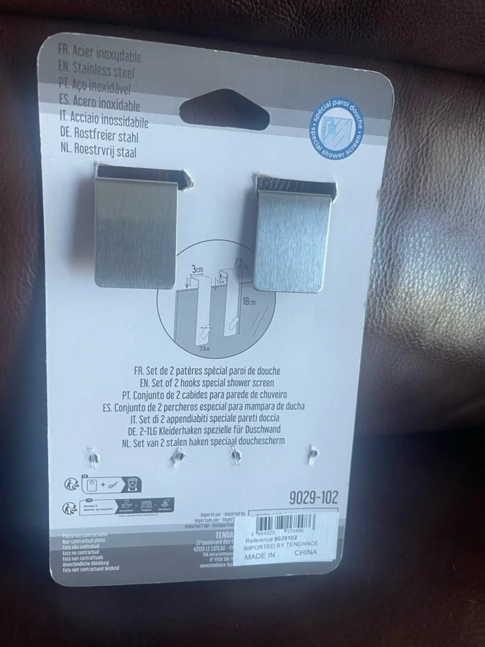 Over the shower towel holder, shower door hooks
